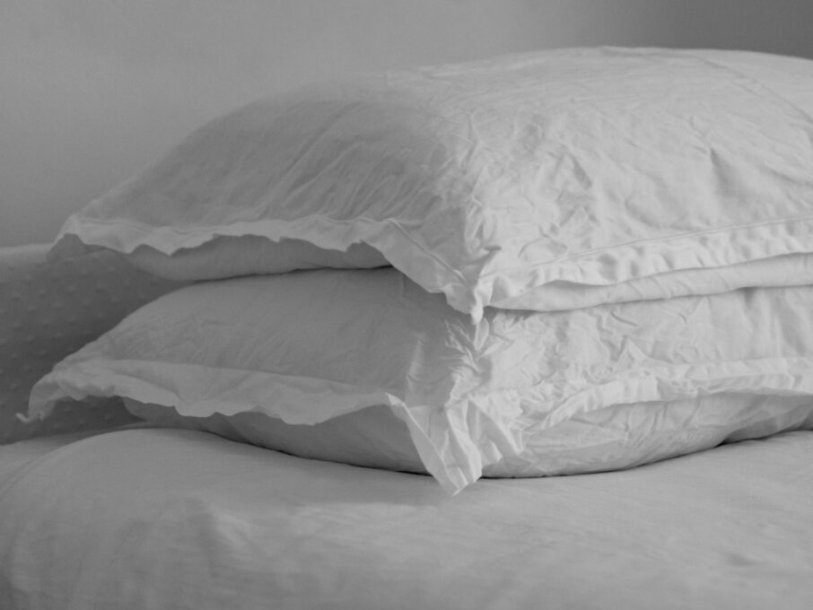 A made bed in a bedroom
