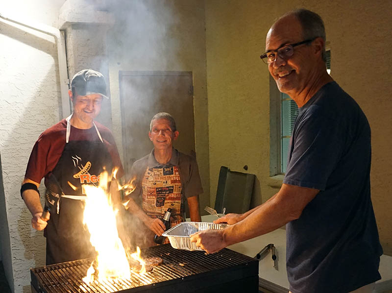 A man cooking over a fire