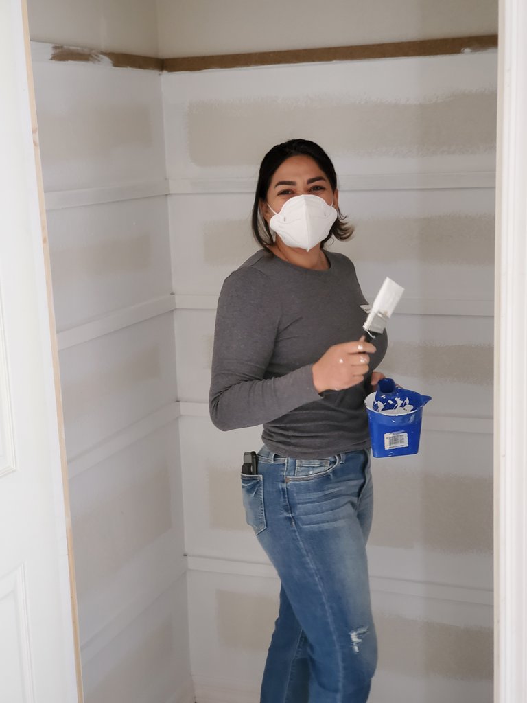 A woman standing in a room