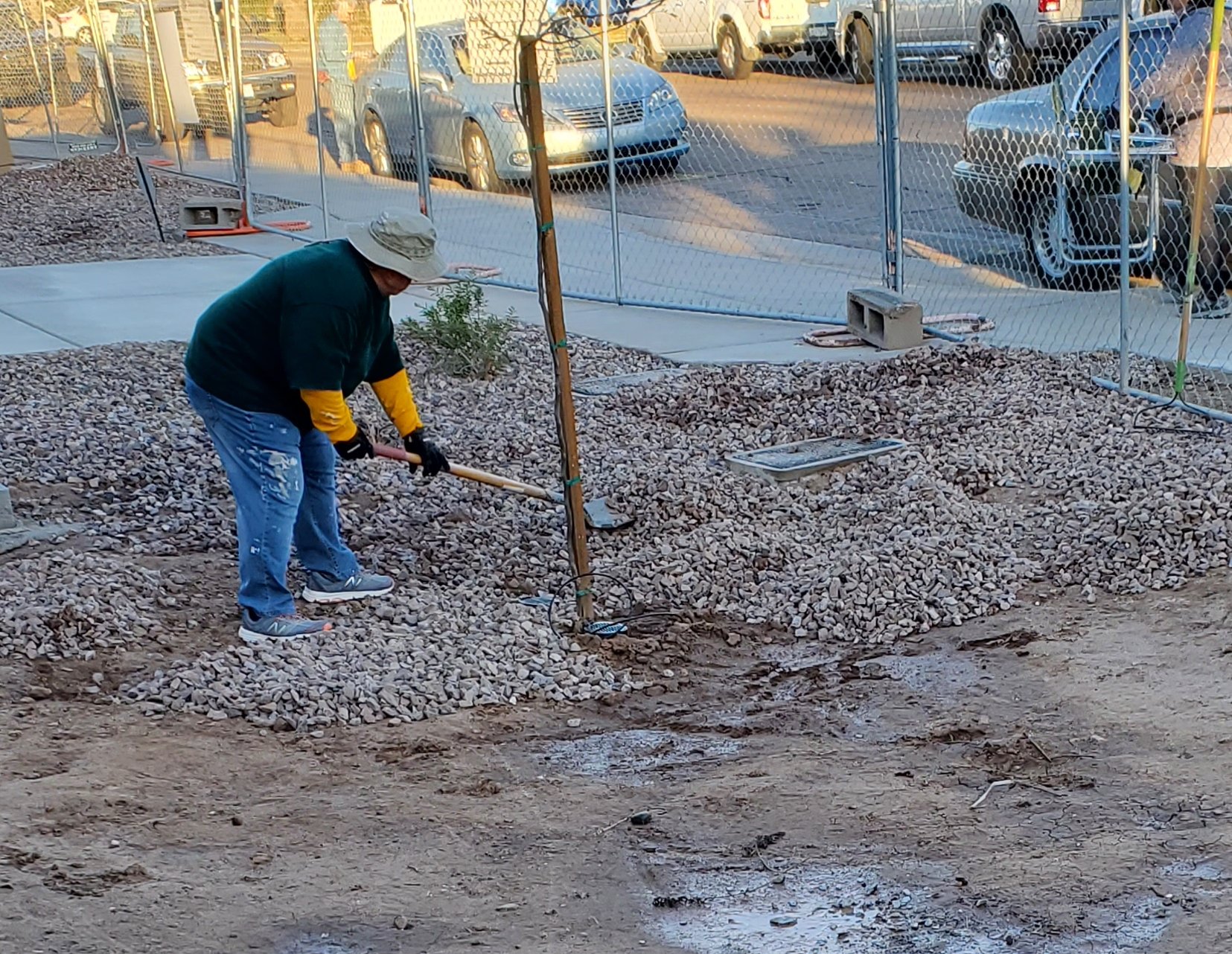 A man that is standing in the sand