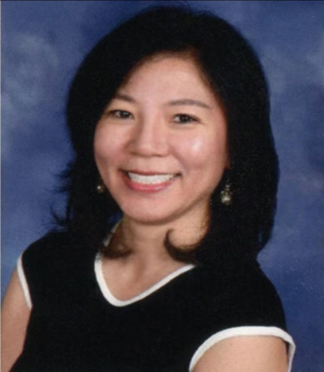 A woman smiling for the camera