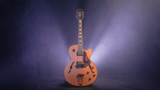 A close up of a guitar