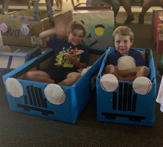 Preschoolers pull up in their ‘cars’ for Drive-in Movie Night ...