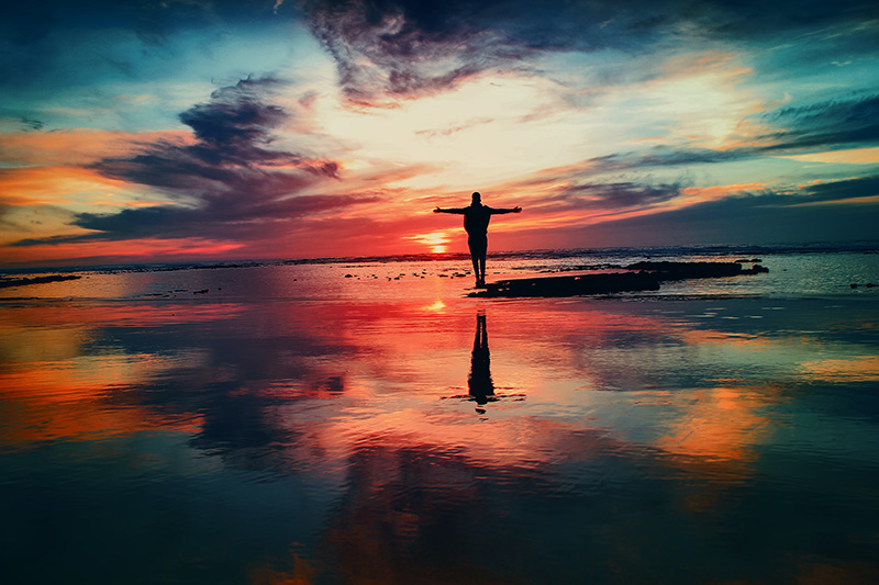A sunset over a body of water