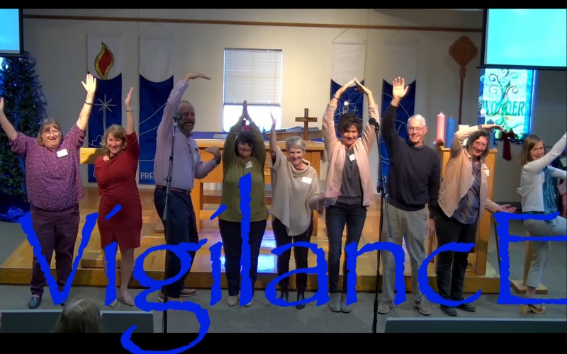 A group of people standing in a room