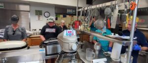 A group of people performing on a counter