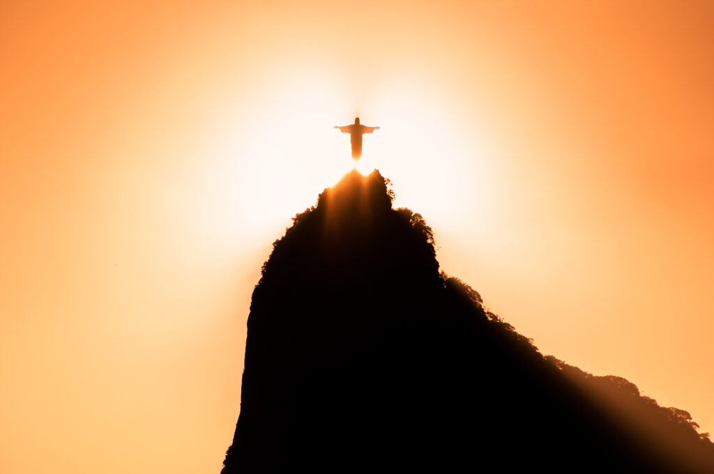 The sun is setting in front of a sunset