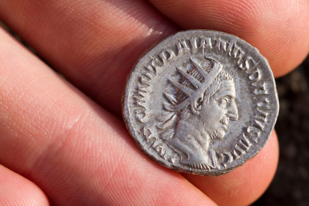Roman silver coin with portrait of caesar