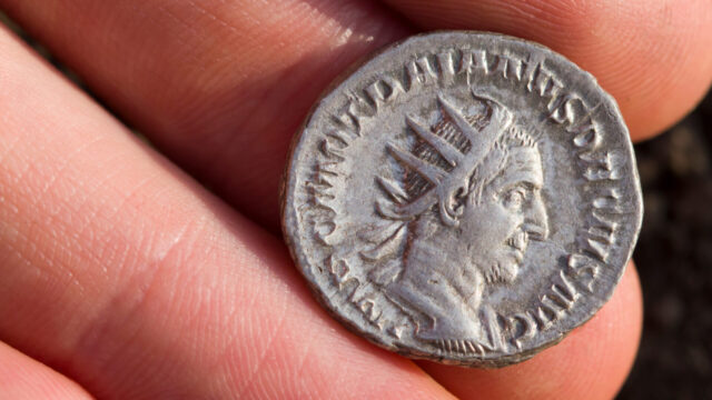 Roman silver coin with portrait of caesar