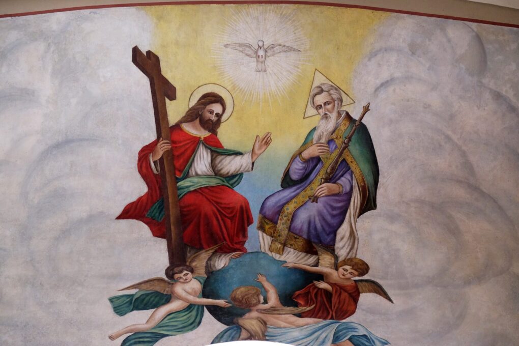 STITAR, CROATIA - AUGUST 27: Holy Trinity, fresco in the church of Saint Matthew in Stitar, Croatia on August 27, 2015