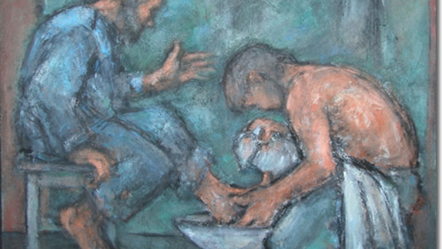 A man washing another man's feet