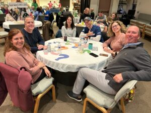 A group of people sitting at a table