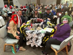 A group of people sitting in a chair