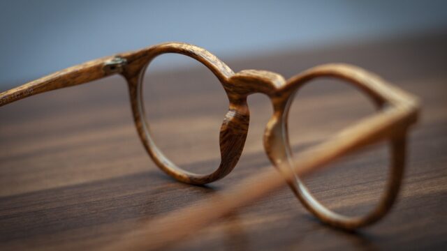 a pair of eyeglasses on a table top