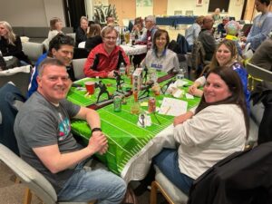 A group of people sitting at a table
