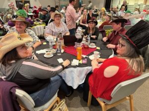 A group of people sitting at a table