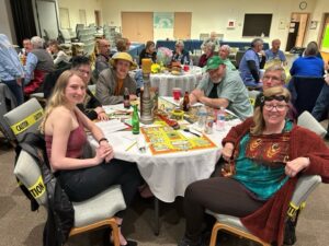 A group of people sitting at a table