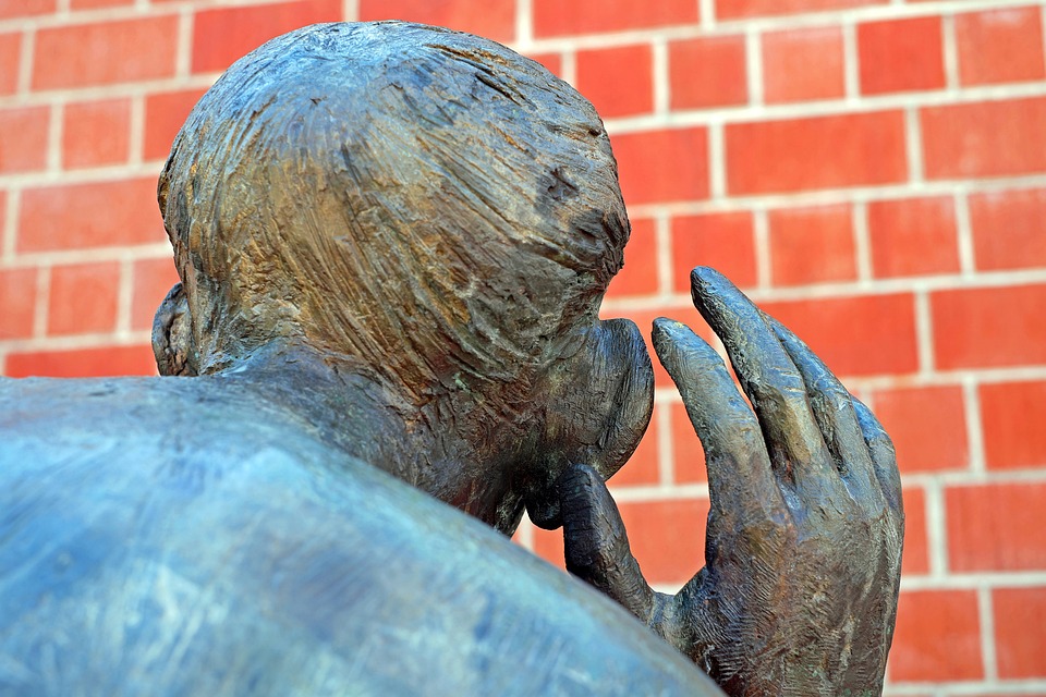A close up of a statue