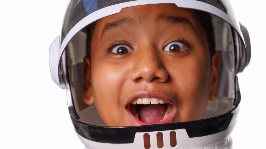 A close up of a person wearing a helmet